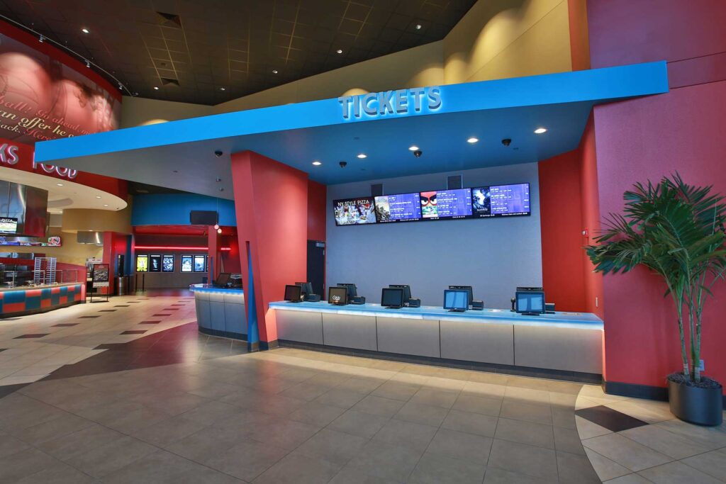 Colorful cinema ticket counter and lobby interior